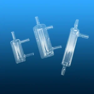 Two clear quartz overflow bottles, highlighting their robust, multi-port design and pristine transparency, suitable for precise fluid handling.