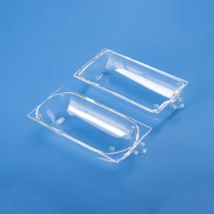 Two high-purity clear quartz boats with matching anti-slip lids, showcasing a rectangular and a rounded-bottom design, on a blue background.