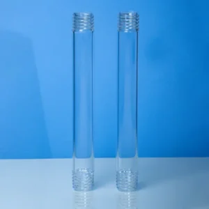 Two clear quartz glass tubes with external screw threads at both ends, standing vertically on a blue background, showcasing their threaded design.