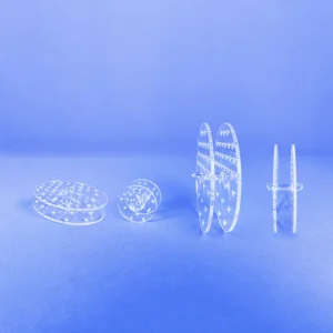 Quartz Gas Diffuser | Fused Silica Furnace Tube Gas Distributor 6 Several clear quartz perforated plates arranged to illustrate different configurations of gas diffuser inserts.