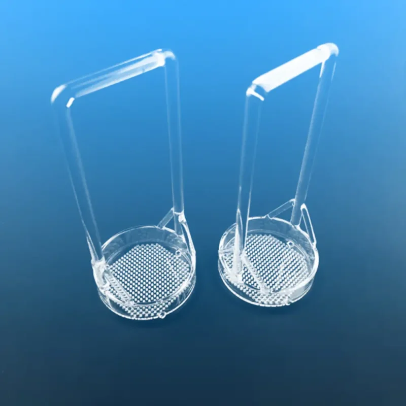 Detailed close-up of the perforated base of a quartz dipping basket, illustrating the precise hole pattern for efficient drainage and immersion.